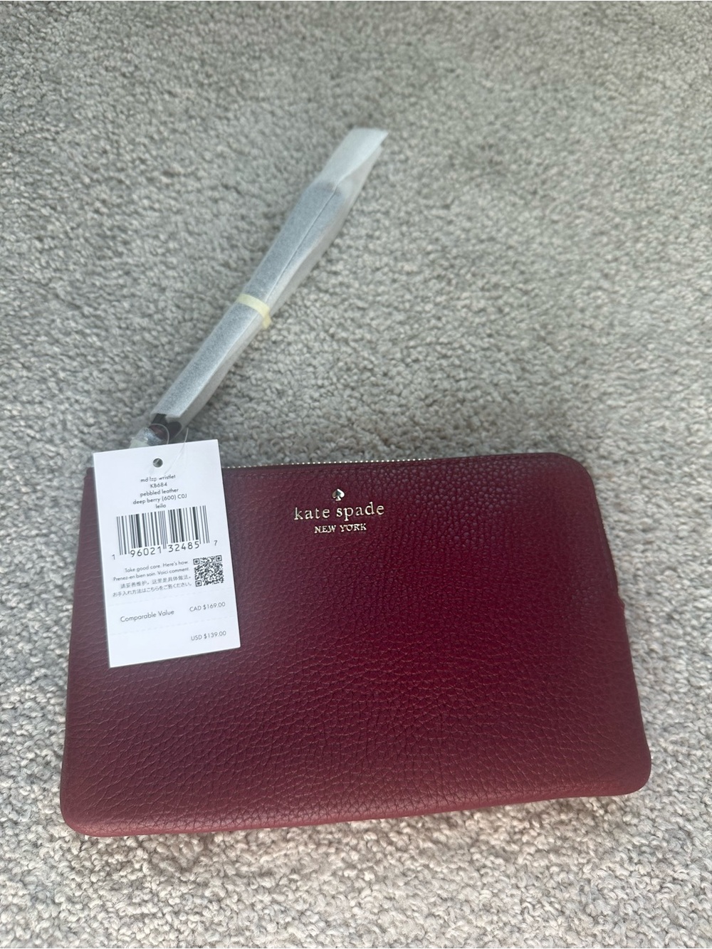 kate spade burgundy pebbled leather wristlet clutch